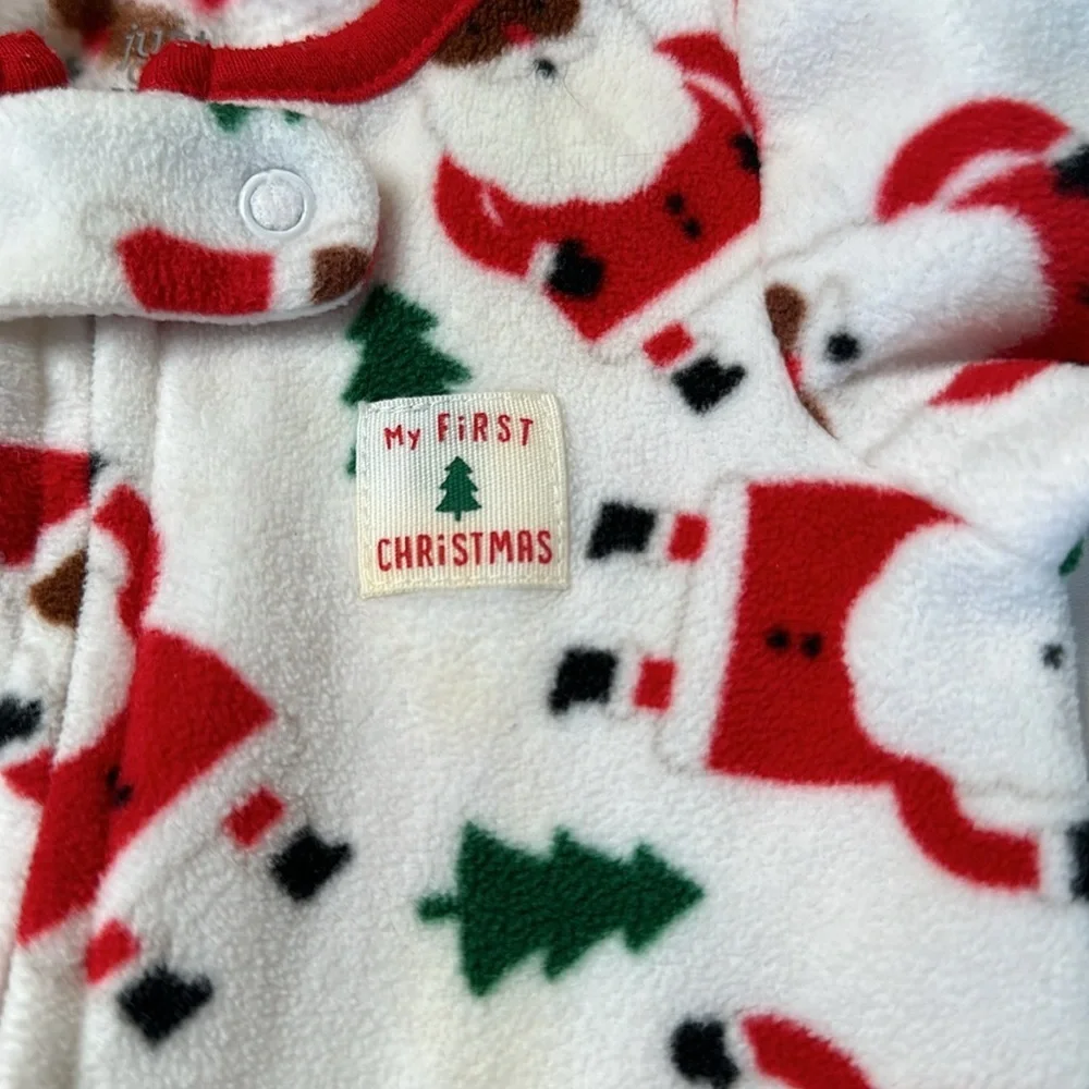 Carter’s baby girl Christmas bundle. One pair of fleece footed pajamas, one tutu